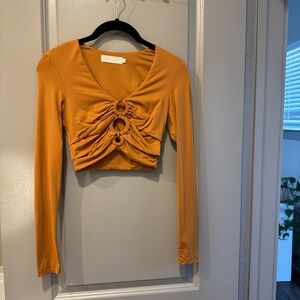Meshki Rust Orange Long Sleeve Ruched Crop Top with Ring Detail